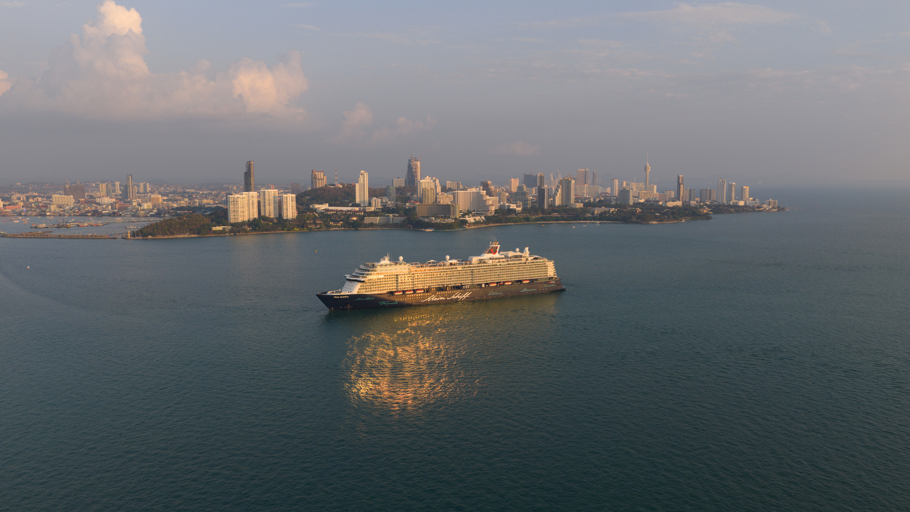 Pattaya City, Thailand - 06 March 2026: Aerial view of Mein Schiff 6 cruise ship in Pattaya Bay, Thailand, showing luxury travel, tourism, maritime transport and passenger cruise holiday.