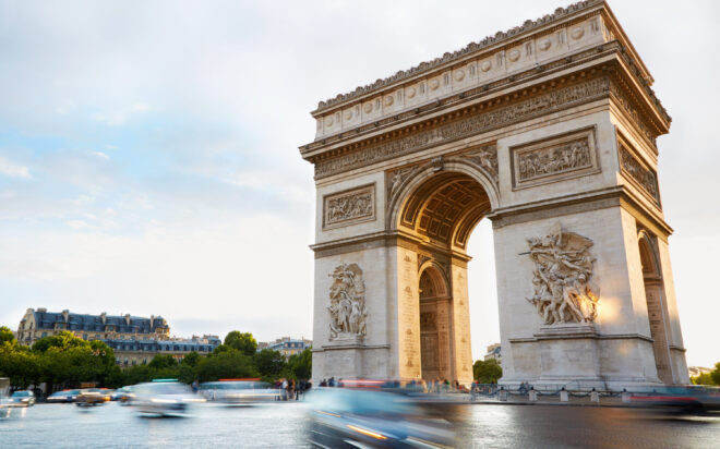 Arc de Triomphe in Paris, France. Traffic in the morning.